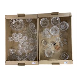 Eight Stuart crystal dessert bowls, early 19th century wine glass, Mats Jonasson bird paperweight and assorted glass in two boxes