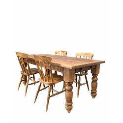 Waxed pine farmhouse dining table fitted with draw on each end, raised on turn supports (92x183, H77cm) with four beech dining chairs (W42cm).