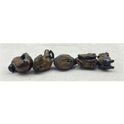 Five netsuke, modelled as a pig, warthogs, deer, duck and a fish