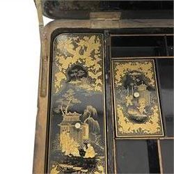 Early 19th century Chinoiserie work or sewing table, rectangular lid decorated with traditional figural and landscape scene within borders of trailing foliate and dragon motifs, the interior with a combination of lidded compartments, sliding sunken storage well, with ivory lids and handles, turned pillar supports on splayed feet united by turned stretchers, carved with hairy paw terminals

This item has been registered for sale under Section 10 of the APHA Ivory Act