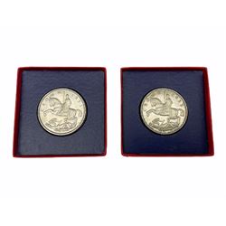 Two Kind George V 1935 specimen crown coins, each housed in red and blue card box