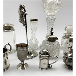Silver paper spike  with an attached climbing bear, five silver mounted glass dressing table jars, pair of glass and silver inkwells and other items 