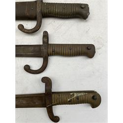 German bayonet, the ricasso marked Waffenfabrik Mauser A.G. Oberndorf , 37cm shaped blade and eight French Chassepot and Gras bayonets