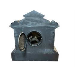 French - late 19th century 8-day Belgium slate mantle clock c1880, with a gable pediment and brass repoussé frieze beneath with a depiction taken from Greek mythological antiquity, dial flanked by recessed reeded pillars on a rectangular plinth with incised chasing, two part enamel dial with Arabic numerals and fleur di Lis steel hands,  rack striking French movement, striking the hours and half hours on a coiled gong. With pendulum.