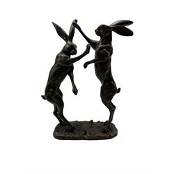 Bronze figure group modelled as two boxing hares, with foundry mark, H28cm
