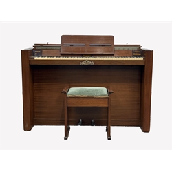  Early 20th century Art Deco 'Eavestaff' Miniature upright piano, overstrung, in walnut case,  Patent No 377641, (W141cm)  together with a walnut stool with upholstered seat,   