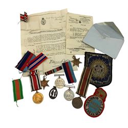 Group of four WWII medals to LieutenantJ Wood comprising 1939-45 Star, Burma Star, War Medal and Defence Medal, George V and George VI Special Constabulary Long Service Medals to Fred Clappison, Bisley 1946 and India Rifle Team cloth badges and N.R.A. Rifle Clubs medallion badge