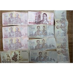 Great British and World coins, including small number of pre 1947 silver coins, pre-decimal coinage, United States of America, Netherlands, Italy etc, various Thailand banknotes including one-thousand baht notes etc, part filled Whitman folders and a stamp stockbook