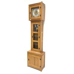 Peter 'Rabbitman' Heap of Wetwang - Yorkshire oak longcase clock, square hood with dentil cornice over trunk door with three glazed panels, panelled door to base, brass dial with silvered Roman chapter ring, inscribed 'Schmeckembecher, Western Germany,' eight day movement striking the hours and halves, signed with Rabbit signature H199cm

