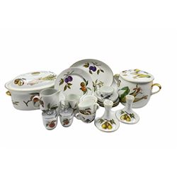 Royal Worcester 'Evesham' pattern tea and dinner wares including ramekins, cups and saucers, serving dish, large tureen, lidded dish etc and a pair of candlesticks (19)