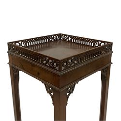 George III Chippendale design mahogany silver table, square top with raised fretwork gallery over banded frieze, raised on square chamfered supports with pierced foliate carved brackets
Provenance: From the Estate of the late Dowager Lady St Oswald