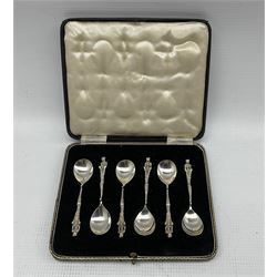Pair of engine turned serviette rings, cased and engraved with initials Birmingham 1929, pair of plain silver serviette rings, set of six silver coffee spoons with figure finials Sheffield 1935 Maker Thomas Bradbury, six bead knop coffee spoons and six silver handled pastry knives approx 7oz
