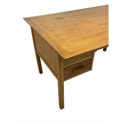 Mid-20th century oak kneehole desk, rectangular top, fitted with four drawers, on square supports