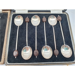 Set of six silver coffee spoons with coloured enamel finials Birmingham 1947 Maker Joseph Gloster Ltd, set of six silver Apostle tea spoons with spiral stems Birmingham 1906 and six silver bead knop coffee spoons