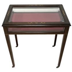 Gott's of Pickering - late 20th century Edwardian Revival mahogany Bijouterie table, bevel glazed hinged lid in moulded frame decorated with boxwood stringing and trailing foliate inlays, bevel glazed sides with satinwood band, on square tapering supports with brass cups and castors, the inner supports inscribed 