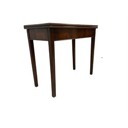 George III mahogany side table, rectangular fold-over extending top with moulded edge, raised on shaped square supports