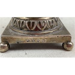 George III silver sugar basket of tapeing form with pierced and acanthus leaf sides engraved with a crest of a dragon holding a sword, swing handle, pedestal foot and square base H15cm London 1773 Maker John Lambe 7.5oz 