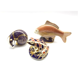 Royal Crown Derby 'Golden Carp' paperweight and two others 'Frog' and 'Badger' all without stoppers