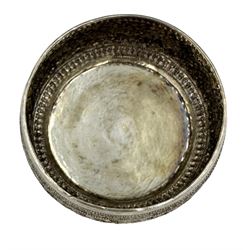 Indian white metal box and cover chased with flower heads and leaves D9cm, tests as approx  75% silver 