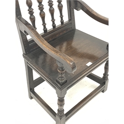 Late Victorian 17th century style armchair, turned spindle back with carved cresting rail, moulded plank seat, turned front supports joined by stretchers, W57cm