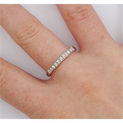 18ct white gold channel set round brilliant cut diamond half eternity ring, stamped 750