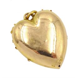 Victorian Etruscan revival gold heart shaped pendant, set with a single old cut diamond, stamped 15ct