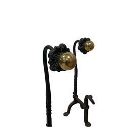 Collection of fireside accessories - fireside tools on stand (H92cm); fire dogs or andirons with rose cast terminals and globular brass mounts; pierced fire curb; wrought metal spark screen; two fireside tools (7)