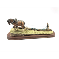 Border Fine Arts group of Horses ploughing entitled 'Stout Hearts' from the James Herriot series by Ray Ayres on a wooden plinth L47cm overall