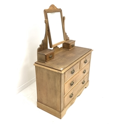Edwardian pine dressing chest, raised back with swing mirror supported by shaped uprights, two trinket drawers, above two short and two long drawers, shaped plinth base 