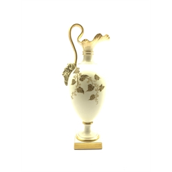 Royal Worcester blush ivory ewer the base of the handle decorated with a satyr mask and decorated with floral sprays, raised on a gilt square base, H29cm 