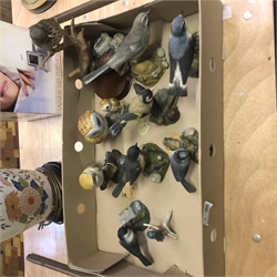 Various models of birds, in one box