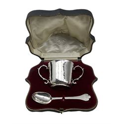 Hammered silver two handled cup H 7cm, Britannia standard London 1920, Maker Vander and Hedges 6.8oz and a hammered silver trefid end spoon with rat tail bowl  London 1917 Maker Goldsmiths and Silversmiths Co 1.1oz
