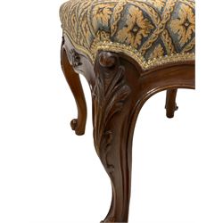 19th century walnut dressing stool, the square seat upholstered in blue and old foliate patterned fabric, shaped frieze with scroll moulding, raised on cabriole supports (W49cm H45cm); and a  walnut framed footstool, the circular top with needlework and floral beaded decoration, on compressed bun feet (W40cm H14cm)