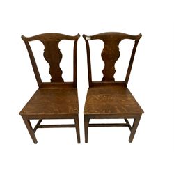 Pair George III oak side chairs, yoke cresting rail with shaped splat, panelled seat over square chamfered supports united by H-stretcher 