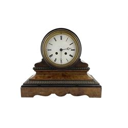 French 19th century  - Burr walnut and ebony 8-day library clock, drum movement with an enamel dial, Roman numerals and minute markers with steel moon hands, count wheel striking movement, striking the hours and half hours on a bell. With pendulum.