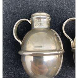Pair of white metal salt and pepper pots in the form of Guernsey milk jugs, stamped silver, boxed