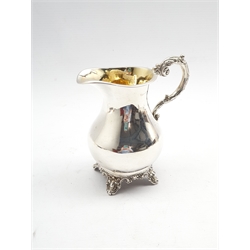 Early Victorian silver cream jug with gilded interior and scroll handle on shaped supports H13cm London 1837 Maker Henry Holland 5.9oz