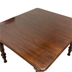 Victorian mahogany extending dining table, rectangular ovolo-moulded top with rounded corners, pull-out action with two additional leaves, on turned and lappet carved supports 