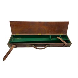 Winchester leather trimmed shotgun case, L80cm together with a brass bound shotgun case with leather straps (2)
