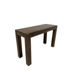 Contemporary hardwood console table raised on block supports W120cm