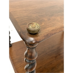 Victorian walnut two tier whatnot, with serpentine front and spiral turned supports, raised on brass cup castors, and a Victorian walnut swing mirror 