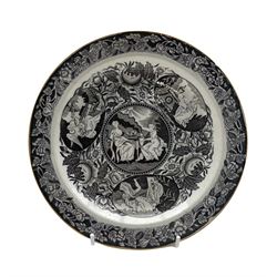 Early 19th century small pearlware plate printed all over in black with a central roundel and three ovals with figures grieving over the tomb of Nelson with floral border, possibly Wedgwood D21cm