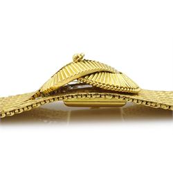 Garrard 18ct gold ladies manual wind wristwatch, the watch concealed by knot design cover, on integral herringbone link bracelet, London 1958, boxed
