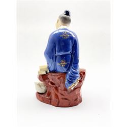 20th century Chinese ceramic group depicting a seated Scholar, a goose at his feet, impressed and printed marks beneath, H22cm 
