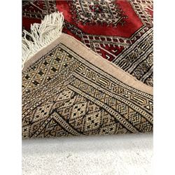 Persian Bokhara runner rug, with gul motif enclosed by repeating border 378cm x 84cm