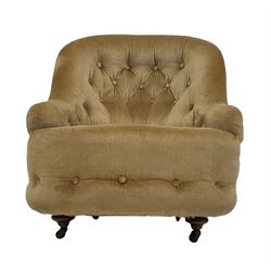 Victorian tub chair, upholstered in beige fabric, raised on turned supports 