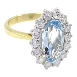 18ct gold oval aquamarine and diamond cluster ring, hallmarked, aquamarine approx 2.40 carat, total diamond weight approx 1.25 carat