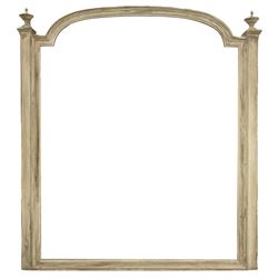 Distressed painted wall mirror, stepped arched moulded frame with lobe carved finials, bevelled mirror plate