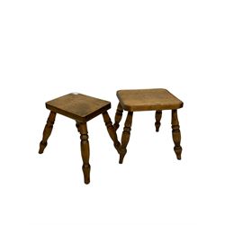 Four small oak stools of various sizes 