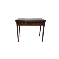 George III mahogany fold over tea table, the fold over top over two frieze drawers, raised on square tapering supports